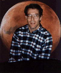 Photo of  Kim Stanley Robinson and behind him, Mars