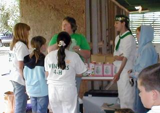 Nancy passes out rabbit awards for Spring Show